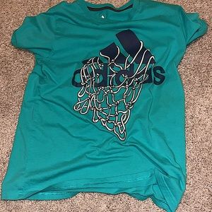 An Adidas Blue shirt that is good for kids👍